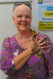 Lady with hand painted with henna